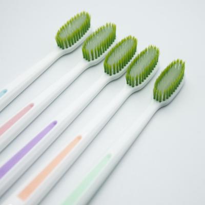 China Soft Hair Custom Personalized Home Use PP Long Handle Plastic Adult Toothbrush for sale