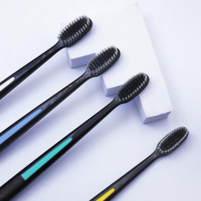 China Bamboo Charcoal Stiffens Charcoal Single Bamboo Filament Soft Toothbrush For Adults for sale