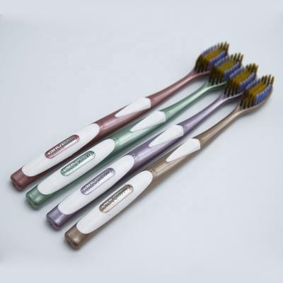 China Ordinary edge Jinshuang bristle top selling spiral toothbrush is suitable for adults and families for sale