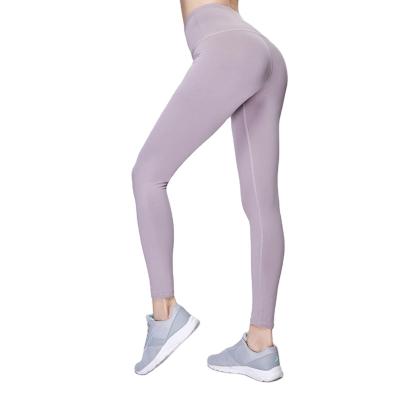 China New Antibacterial Naked Women Yoga Hip Peach Top Small Tight Elastic Working Foot Sports Fitness Lifting Pants High Waist for sale