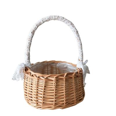 China Modern Flower Basket Rattan Handicraft Flower Arrangement Handwoven Basket for sale