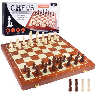 China Chess Game Portable Adult Children Chess Board Foldable International Portable Wooden Magnetic Game for sale