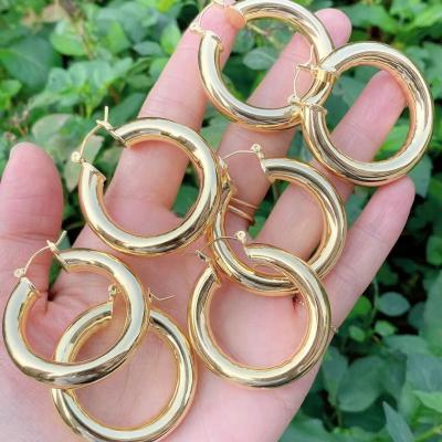 China Hiphop New Arrive 18k European Rock Hiphop Woman Fashion Jewelry Perforation Tube Circle Fashion Huge Solid Geometric Round Earring for sale