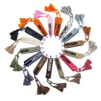 China BOHEMIA Top Selling Different Colors Cotton Woven Friendship Tassel Bracelet Christian Bracelet For Women for sale