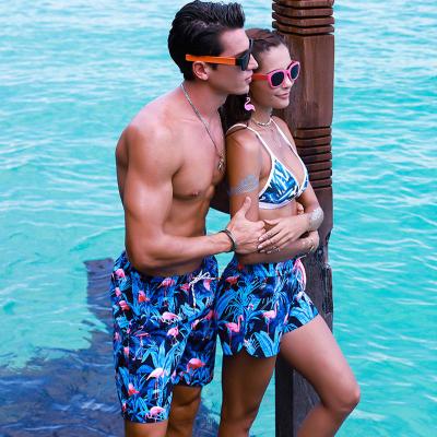 China Custom Waterproof Plus Size 4 Way Summer Stretch Shorts Pants Women Men Couple Swimwear Trunks Print Quick Dry Plus Size Beach Shorts for sale