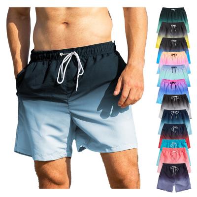 China Anti-Wrinkle Summer Beach Shorts Men's Quick Dry Plus Size Gradient 5XL Board Shorts Mens Casual Sweatpants Pockets Shorts for sale