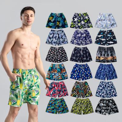 China Plus Size Summer Men Swimming Polyester Beach Shorts Logo Sublimation Printed Custom Plus Size Loose Sports Surf Shorts for sale