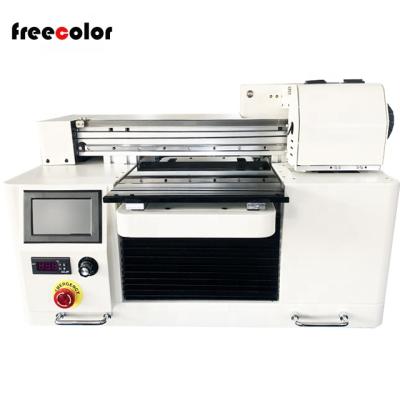 China Freecolor retail small size uv flatbed a3/a2/a4 printer for gift products printing for sale