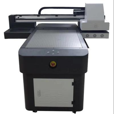 China Advertising company high quality A1 TX800 UV flatbed printer 60cm*90cm with varnish for sale