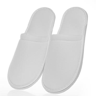 China Narrow Toe Disposable Slipper Cheap Cotton Canvas White Hotel Disposable Slippers for sale