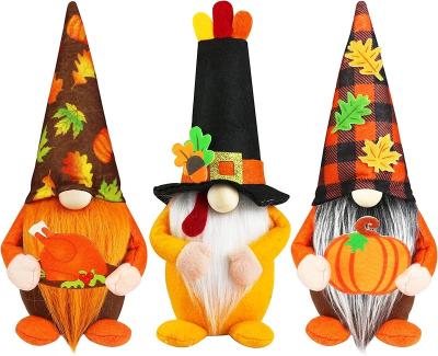 China Kawayi's Other Non-woven Dwarf Carry Turkey Pumpkin Plush Toy Halloween Thanksgiving Day Decor Swedish Halloween Ornament Gifts 12 Inch for sale