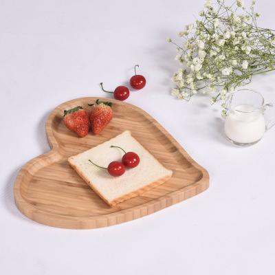 China Environmental protection disposable natural bamboo tray factory direct bamboo heart-shaped creative dinner dish for sale