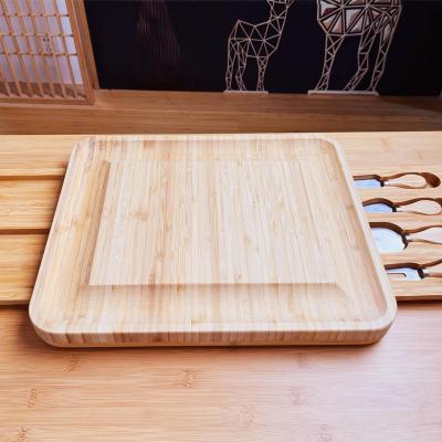 China Disposable Bamboo Wooden Charcuterie Cutlery Knife Cheese Board Set with Serving Plates 2 Magnetic Drawers for sale