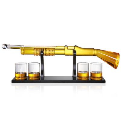 China CLASSIC Creative Design Gun Shaped Glass Whiskey Decanter Whiskey And 4 Wine Glasses Bottle Set for sale