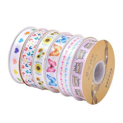 China High tenacity manufacturers customized 2.5cm polyester ribbon heat transfer print pattern text printing exquisite DIY gift apparel ribbon for sale