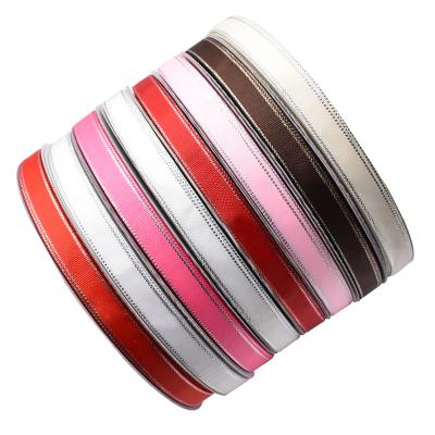 China FAN Viable Factory Direct HAN Double Face Polyester Ribbon With Silver Edge Merry Christmas Ribbon for sale