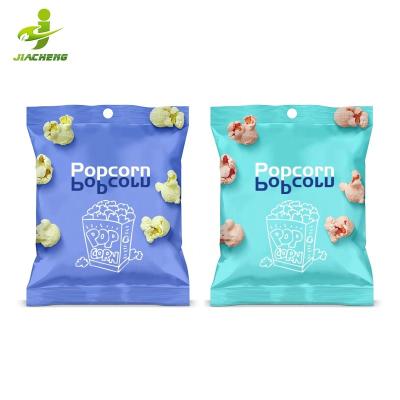 China JIACHENG promotion customized OEM disposable heat sealable bopp gourmet toffee back seal flat bottom popcorn packaging bag for sale