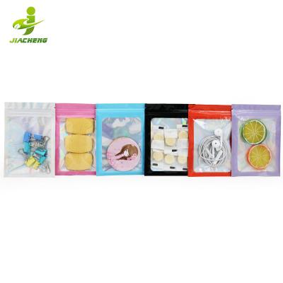 China JIACHENG Hologram Mylar Moistureproof Zipper Plastic Jewelry Makeup Ziplock Packaging Transparent Holographic Bags for sale