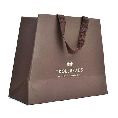 China Custom Wholesale Paper Bag Recycled Materials Printing Logo Bag Shopping Gift Paper Bag Kraft Paper for sale