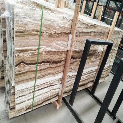 China Traditional Turkey Honed Marble Wall Panels Filled with Brown Jade Onyx Travertino Tra-Onyx Travertine Slabs for sale