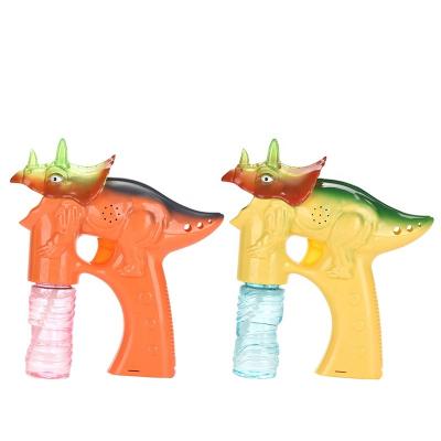 China Plastic Cartoon Animal Shaped Soap Bubble Toys Dinosaur Bubble Air Gun With Light And Sounds for sale