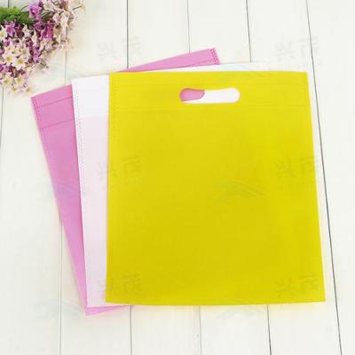 China Promotional Custom Printing Gift Packaging Multicolor Die Cut Bag Handled Eco Friendly D Cut Non Woven Bag for sale