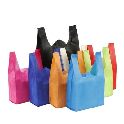 China Cheap Factory Price Eco-friendly 40Gsm Any Color Supermarket Non Woven T-shirt Bag, W Cut Non Woven Bag, Non Woven W Cut Bags for sale