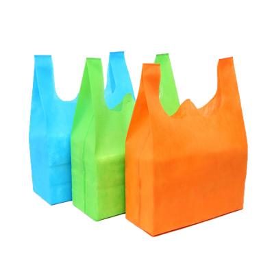 China Factory Promotion Price Eco-friendly Free Sample W Non Woven Cut Bag Fast Delivery 18Gsm T.Shirt Cut Non Woven Bag for sale