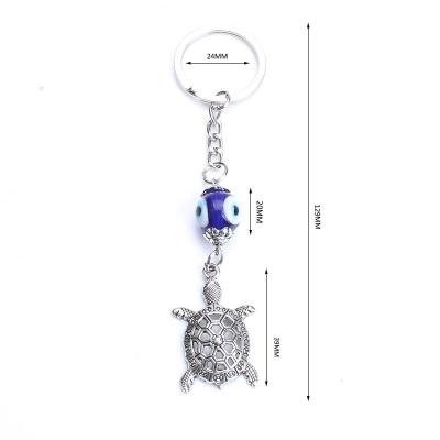 China 2021 Eco Friendly New Arrival Motel Key Chain Oil Drop Lucky Eye Tortoise Pendant Car Key Chain Evil Eye Key Chain for sale