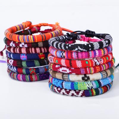 China New High Quality Enthic Style Hand - Woven Colorful Flower Pattern Wristband Bracelets Cotton Rope String Bracelets for sale