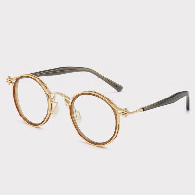 China Retro Retro Glasses Round Metal Eyeglasses Blue Acetate Frames Optical Glasses Computer Light Filter Glasses Eyewear For Man for sale