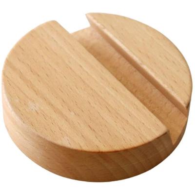 China Round Dustproof Wooden Simple Base Japanese Style Mobile Phone Smartphone Holder Desk Stand for sale