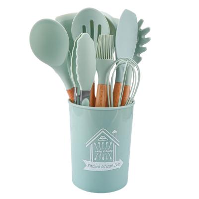 China YiHai Disposable Kitchen Accessories Cooking Tools Kitchen Utensils With 12Pcs Wooden Handle Nonstick Cookware Sets For Home Light Green for sale