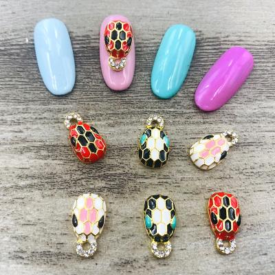 China Qianya 2021 High Quality Luxury Snake Head Luxury Metal Gold Nail Art Charm 3d Nail Decals For Nail Salon for sale