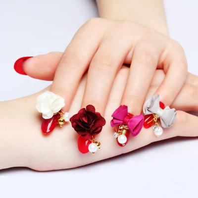 China Fashion DIY Ornaments Qianya New Arrive Magnetic Flower Bow Nail Charm 2022 Popular Supply Magnetic Pom Pom Nail Flower Nail Valentines Day for sale