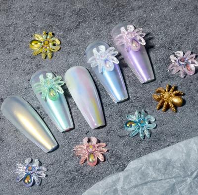 China Spider Shape Qianya Wholesale 12pcs/Box Packing Spider Nail Charms 2021 New Shiny Shimmer Spider Nail Art Halloween Sprider Nail Art Charm for sale