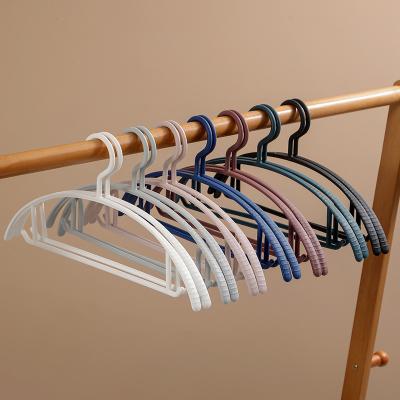 China Eco-Friendly Clothes Hanger Vendors Simple Solid Colour Plastic Adult Clothes Hangers Clothes Drying Racks Half Round Seamless Pp Hanger for sale