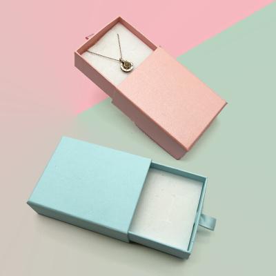 China Jewelry Gift Box and Pouch Packaging 2022 Hot Pink Slide Match Drawer Cardboard Paper Gift Jewelry Packaging Box Hot Welcome for sale