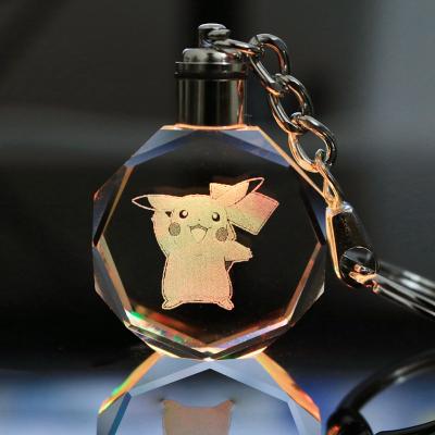 China Wholesale Europe fashion 3d pokemon logo laser engraving LED crystal glass octangle Pikachu key chain for sale