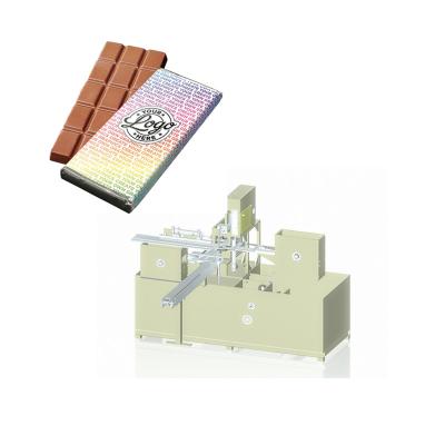 China Multifunctional Food Size Large Chocolate Tablet Sheet Fold And Strip Packing Machine for sale