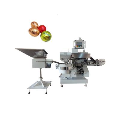 China Wholesale Automatic Handmade Chocolate Ball Packing Machine Chocolate Aluminum Wrapping Line Wrapping Packing Machine For Chocolate Ball Egg for sale