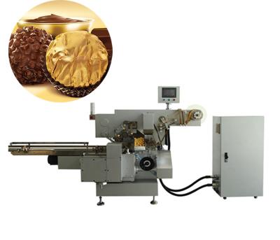 China Food Easy to Use Packaging Machine Dor Nuts in Peanut Chocolate Style Wrapping Wrap Machine for sale