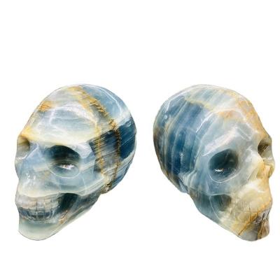 China China Selling Natural Rare Crystal Gem Hand Carved Blue Onyx Skulls For Healing for sale