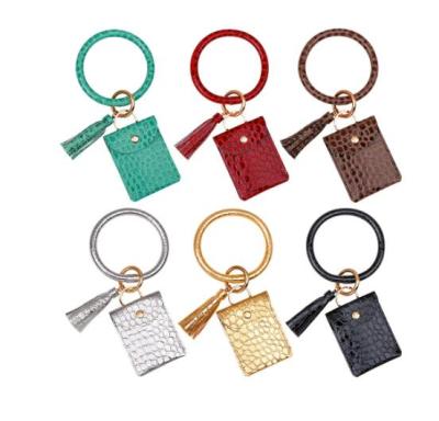 China Hot PU O-ring Leather Wrist Bag Monogram Bag Key Sale Chain for sale