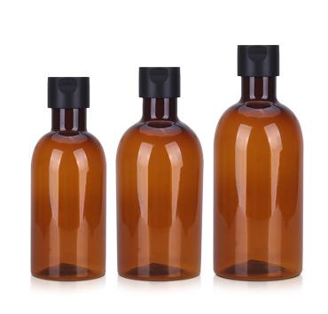 China Customs Service 250ml 300ml 400ml Cosmetic Chic Round Amber Hotel Plastic Shampoo Bottle With Pump for sale