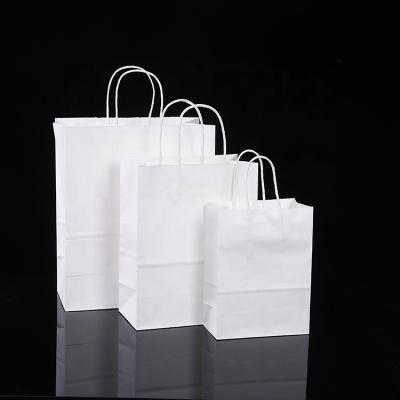 China Recycled Materials Plain White Kraft Paper Bag Goods Shopping Gift Gift Bag for sale