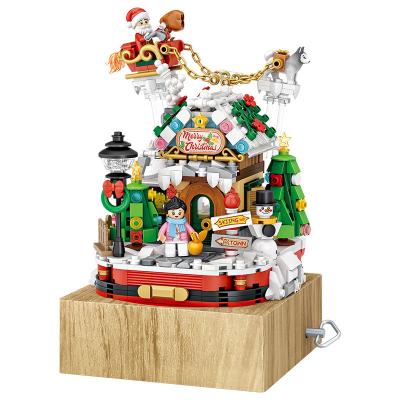 China Toy Creative building particles cultural small and creative toy gift Christmas house music box building blocks for sale