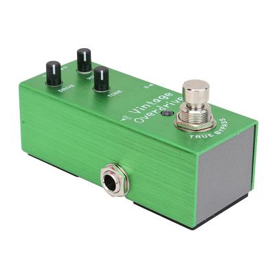 China Magnetic GUITAR XGQ-519 One Piece Electric Guitar Gain Distortion Delay Overload Compression Vibrato Effect Method for sale