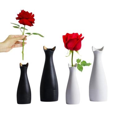 China 100% 2023 Hot Selling Nordic White Black Vases Simple Creative Handmade Central Institute of Statistics Cat Ear Vase Table Decoration for sale