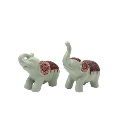 China 100% Handmade Hot Selling Ceramic Animal Statues Lovely Elephants Ornaments Home Decoration Gifts Present for sale